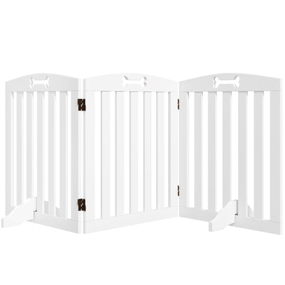 White freestanding dog gate with arched top and bone-shaped cutouts shown from the front