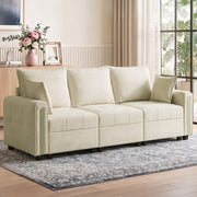 3 seater velvet sofa in a bright living room on a patterned rug
