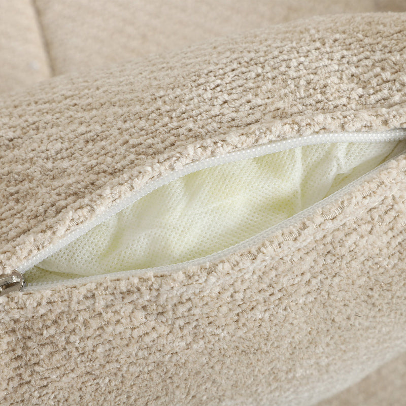 Close-up of the cream white textured fabric with the cushion cover zip partly open