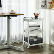 White trolley next to a home office desk holding books, pens and a storage basket
