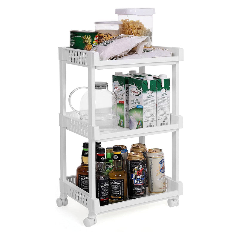 White trolley loaded with tins, cartons, pasta jars and bottles across all three shelves
