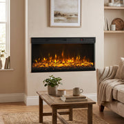 Electric fire with amber flames set into a wall above a wooden coffee table