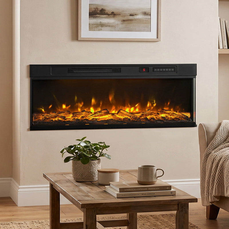 Electric fire with amber flames set into a wall above a wooden coffee table