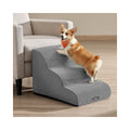 Corgi climbing Feandrea 3-step dog stairs in Dove Grey beside a sofa