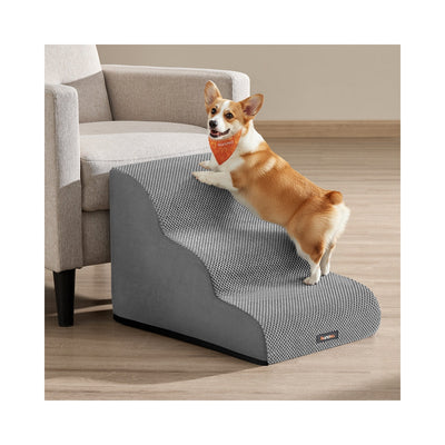 Corgi climbing Feandrea 3-step dog stairs in Dove Grey beside a sofa