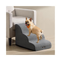 French Bulldog climbing the Feandrea 3-step dog stairs beside an armchair