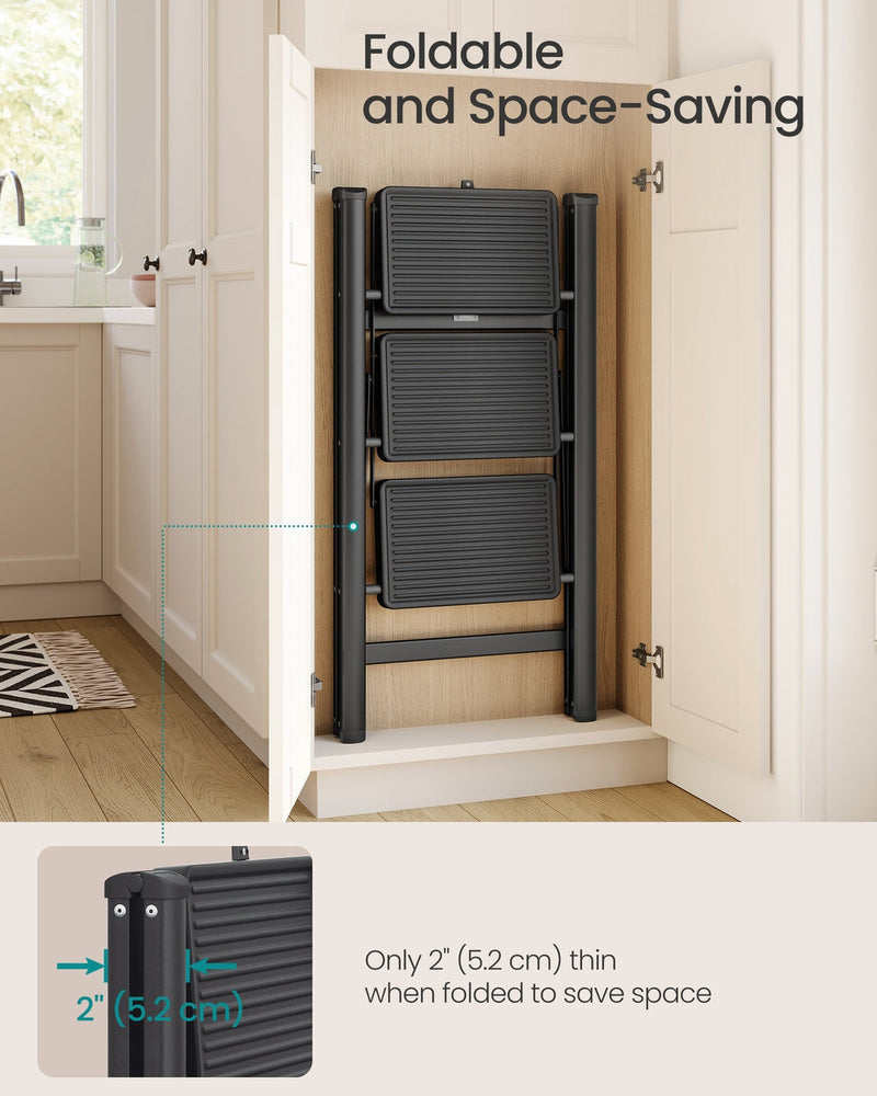 The 3-step ladder folded flat to 5.2 cm and stored upright inside a kitchen cupboard