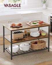 Rustic brown kitchen island in a white kitchen holding a toaster, jars and plates