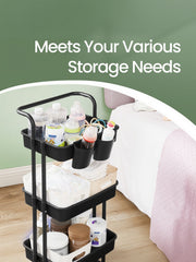 Storage trolley beside a bed holding baby care items and supplies
