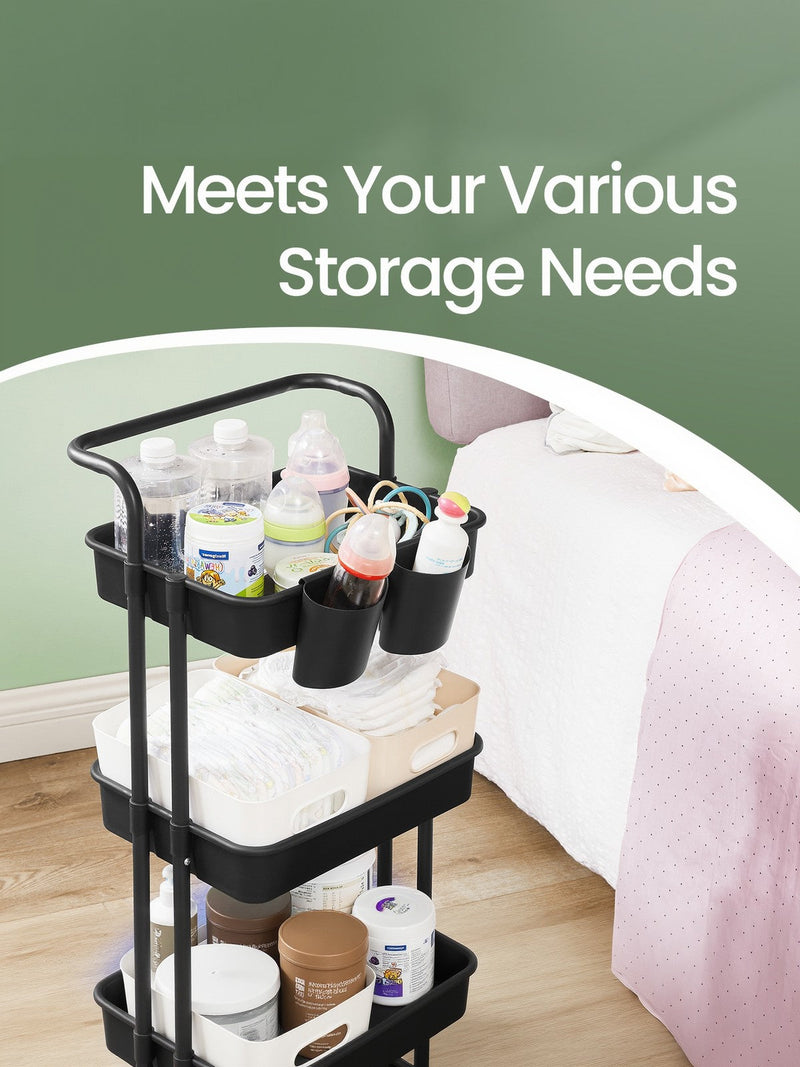 Storage trolley beside a bed holding baby care items and supplies