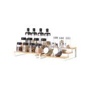 Both spice racks arranged together holding a full collection of glass spice jars