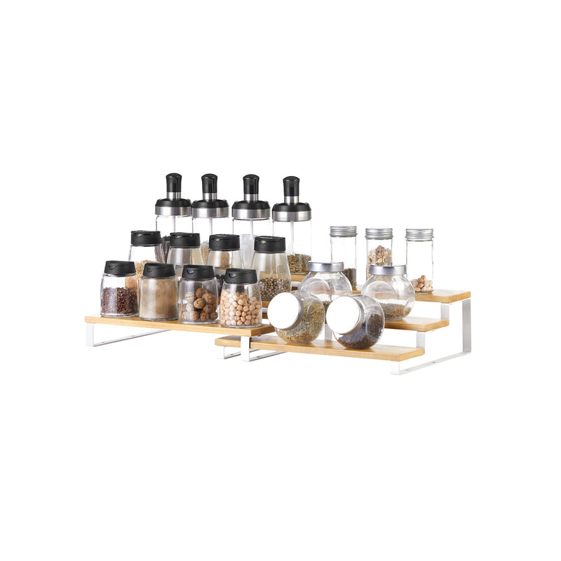 Both spice racks arranged together holding a full collection of glass spice jars