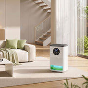 HOMCOM white dehumidifier lifestyle shot in a living room beside a sofa and plant