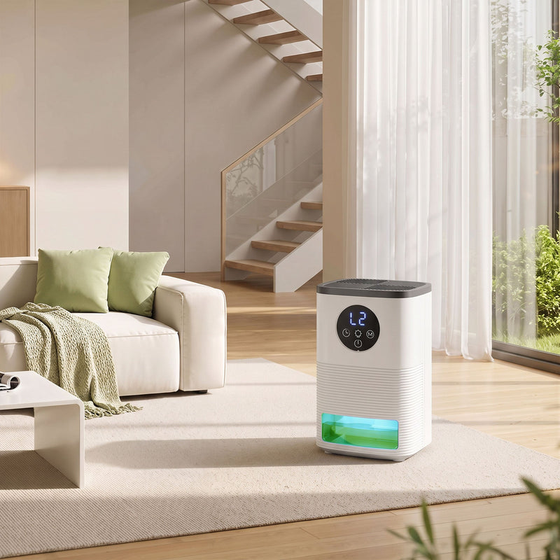 HOMCOM white dehumidifier lifestyle shot in a living room beside a sofa and plant