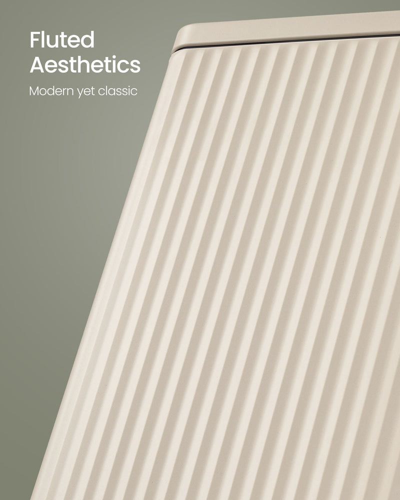 Close-up of the fluted ribbed panels on the beige bin body