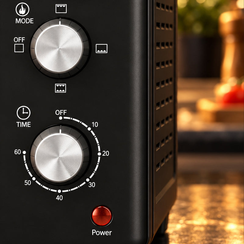 Close-up of the function, temperature and timer knobs and power light