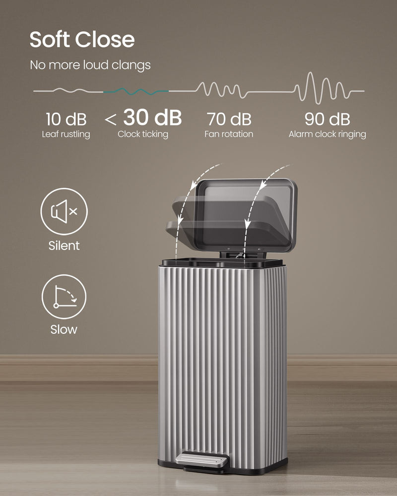 Silver pedal bin shown opening slowly on its soft-close lid mechanism