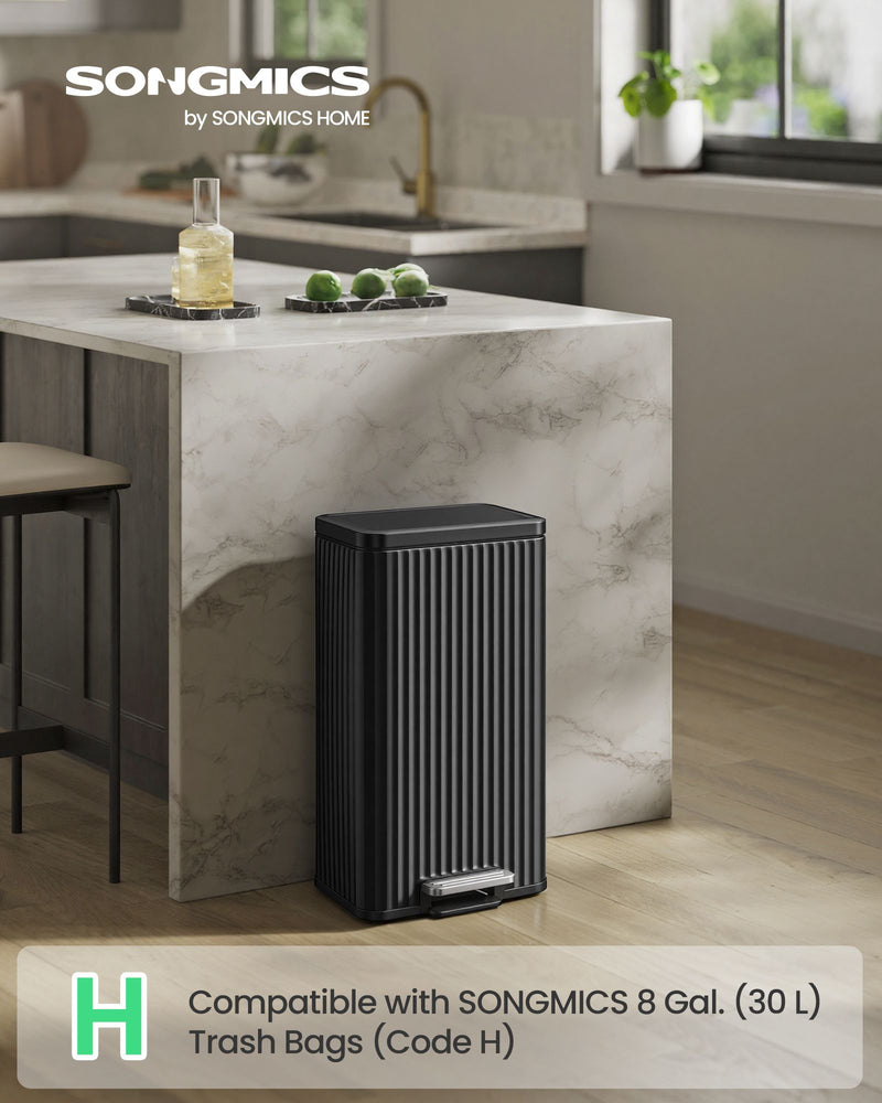 Black SONGMICS pedal bin in a modern kitchen, compatible with 30 L trash bags