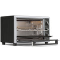 Black 36L mini convection oven with silver trim, door open and rotisserie fork and tray inside