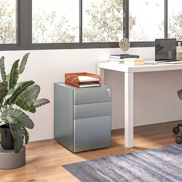 Image of a Grey 3 Drawer Under Desk Pedestal With Wheels and a Lock.