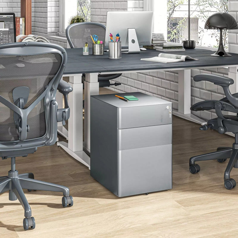 Image of a Grey 3 Drawer Under Desk Pedestal With Wheels and a Lock.
