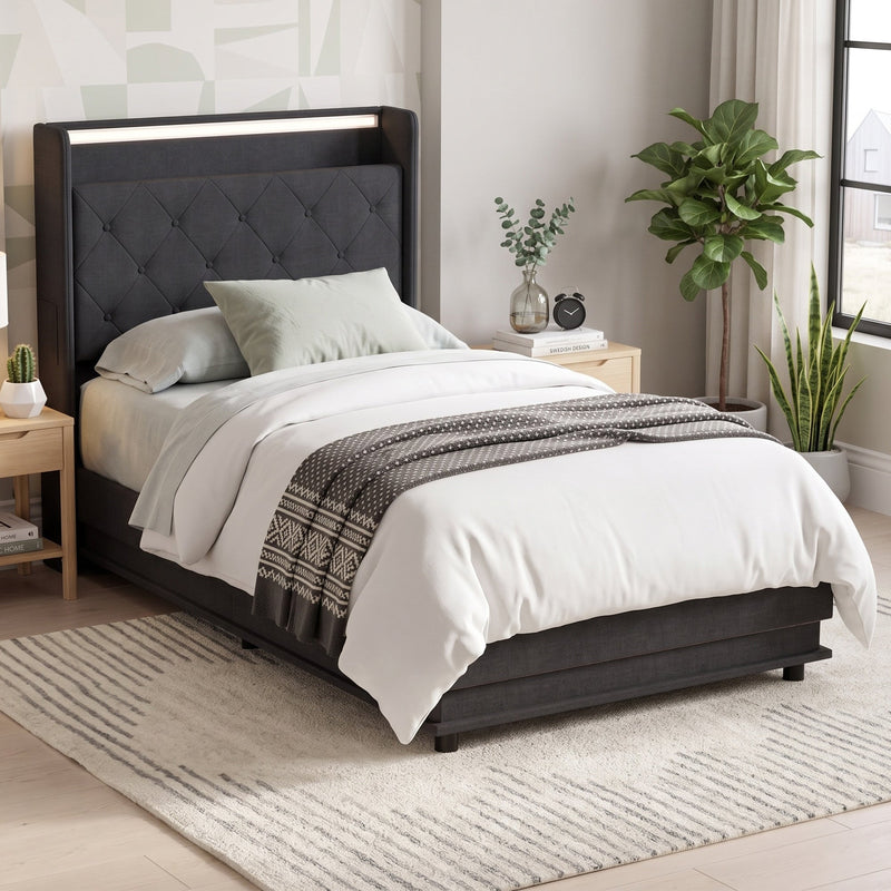 Single ottoman bed frame made up with bedding and a knitted throw in a bedroom