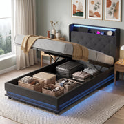 Ottoman bed with the base raised revealing storage baskets and a suitcase