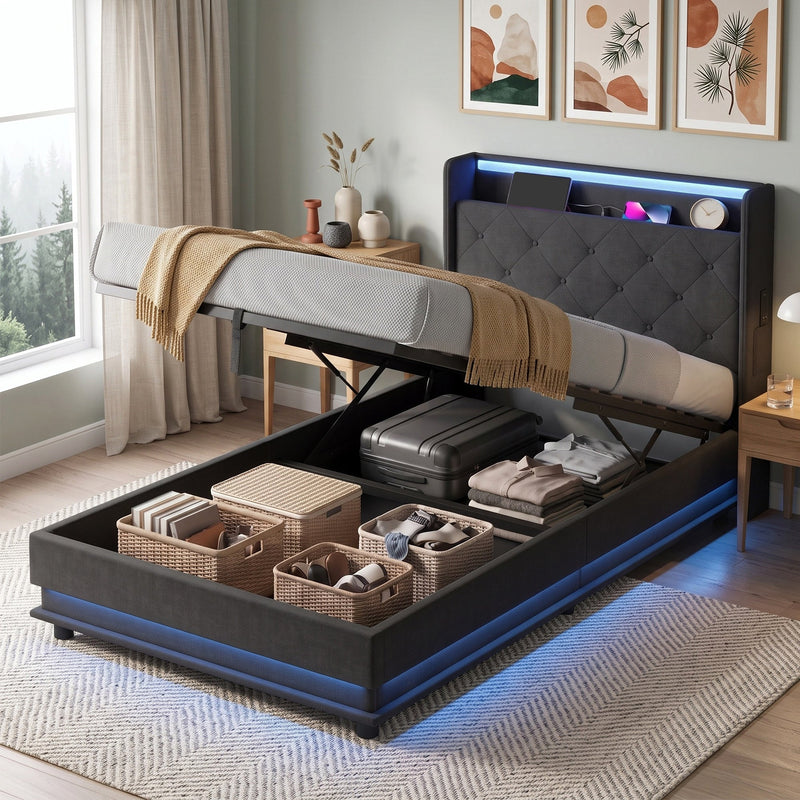 Ottoman bed with the base raised revealing storage baskets and a suitcase