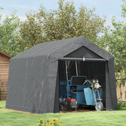 Dark grey storage shed tent set up on a lawn with a motorcycle parked inside