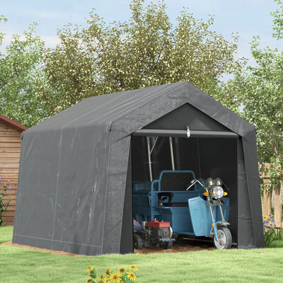 Dark grey storage shed tent set up on a lawn with a motorcycle parked inside