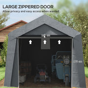 Front view of the wide zippered door opened fully with garden machinery stored inside