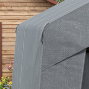 Close-up of the roof fabric and seam on the tent beside a wooden fence