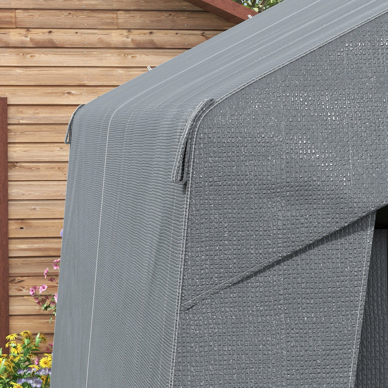 Close-up of the roof fabric and seam on the tent beside a wooden fence