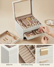 Close-ups of the PU leather corner, soft velvet lining and gold-tone drawer handle