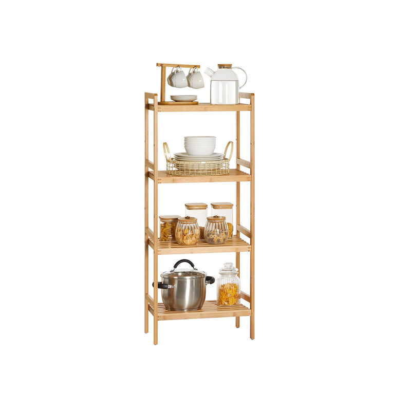 The bamboo unit styled with plates, storage jars, a teapot and a cooking pan