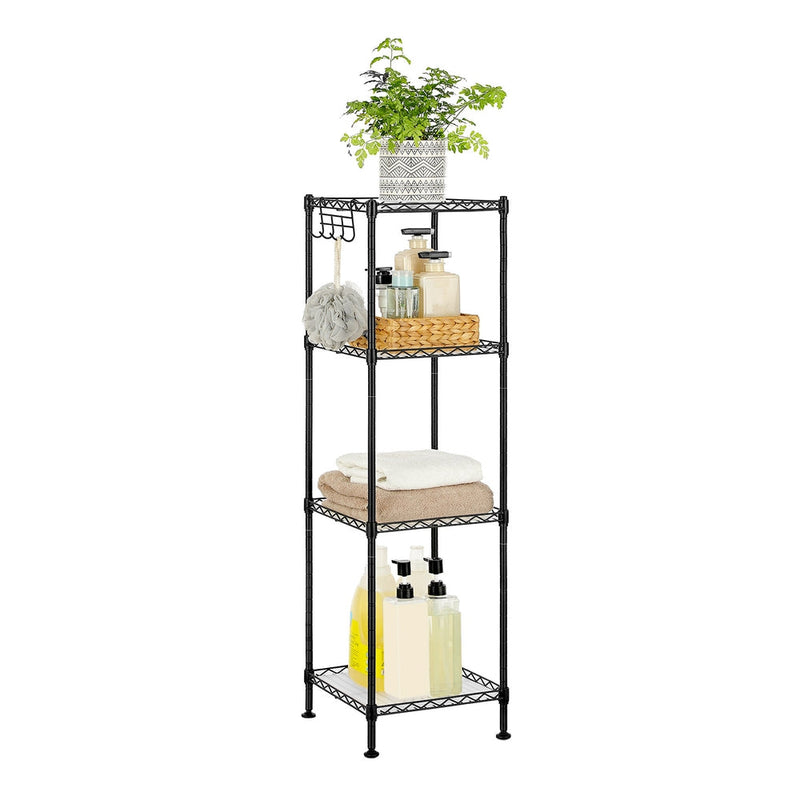 4-tier black wire bathroom shelf holding a plant, toiletries, towels and bottles