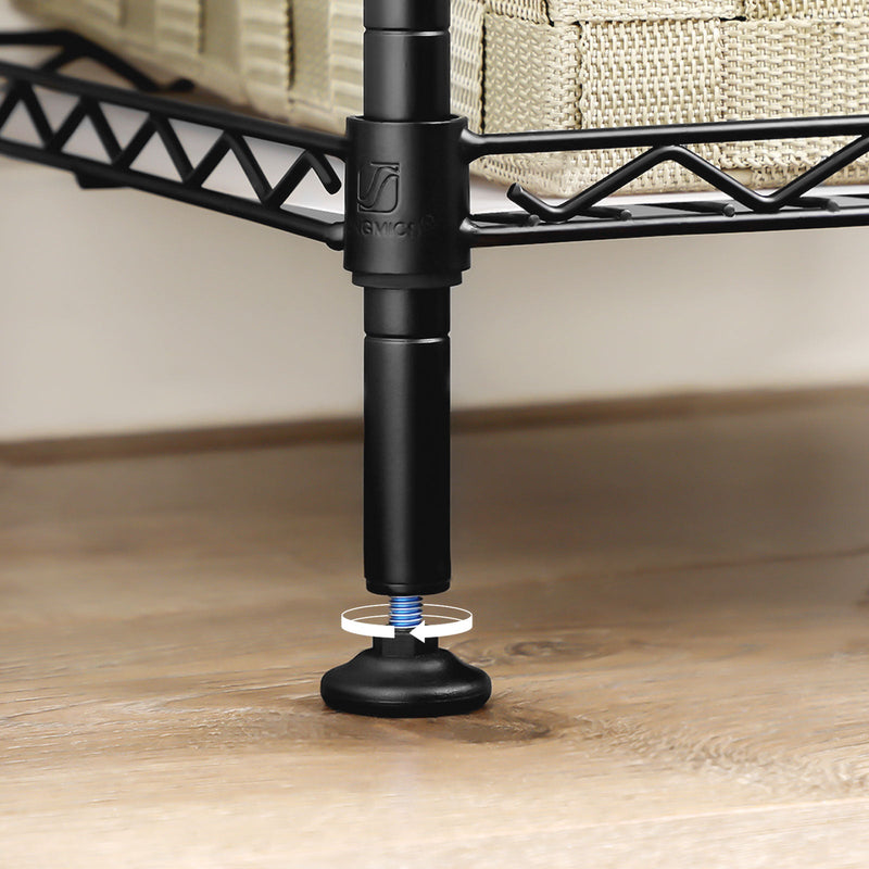 Close-up of the adjustable screw foot at the base of the black post