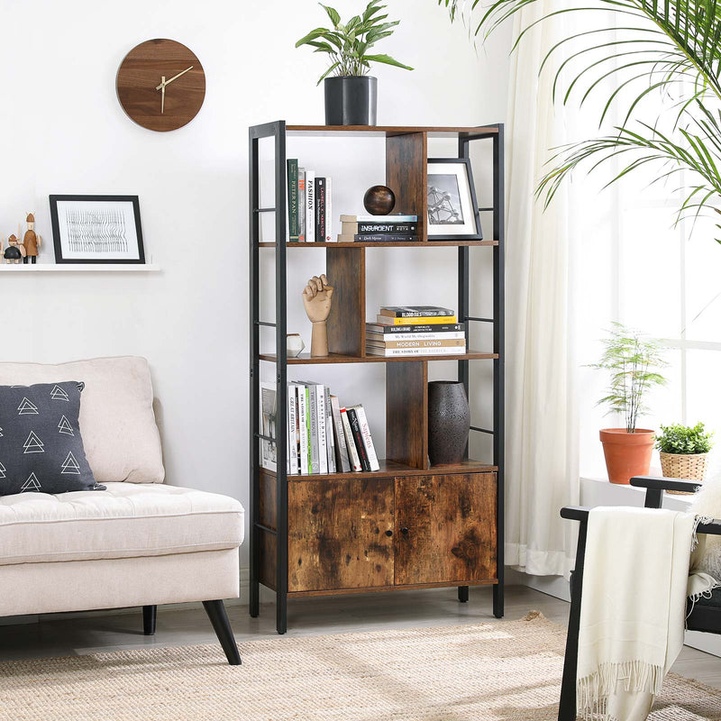 Bookcase in a living room beside a cream sofa, holding books and a plant on top