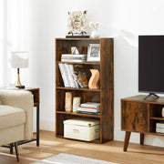 The bookcase in a living room beside a lamp, armchair and low TV unit