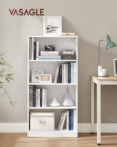 White 4-tier bookcase styled with books and a camera beside a study desk