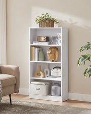 White 4-tier bookcase filled with books and vases next to an armchair
