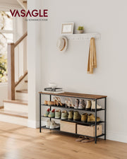 Shoe rack styled in an entryway holding shoes and bags