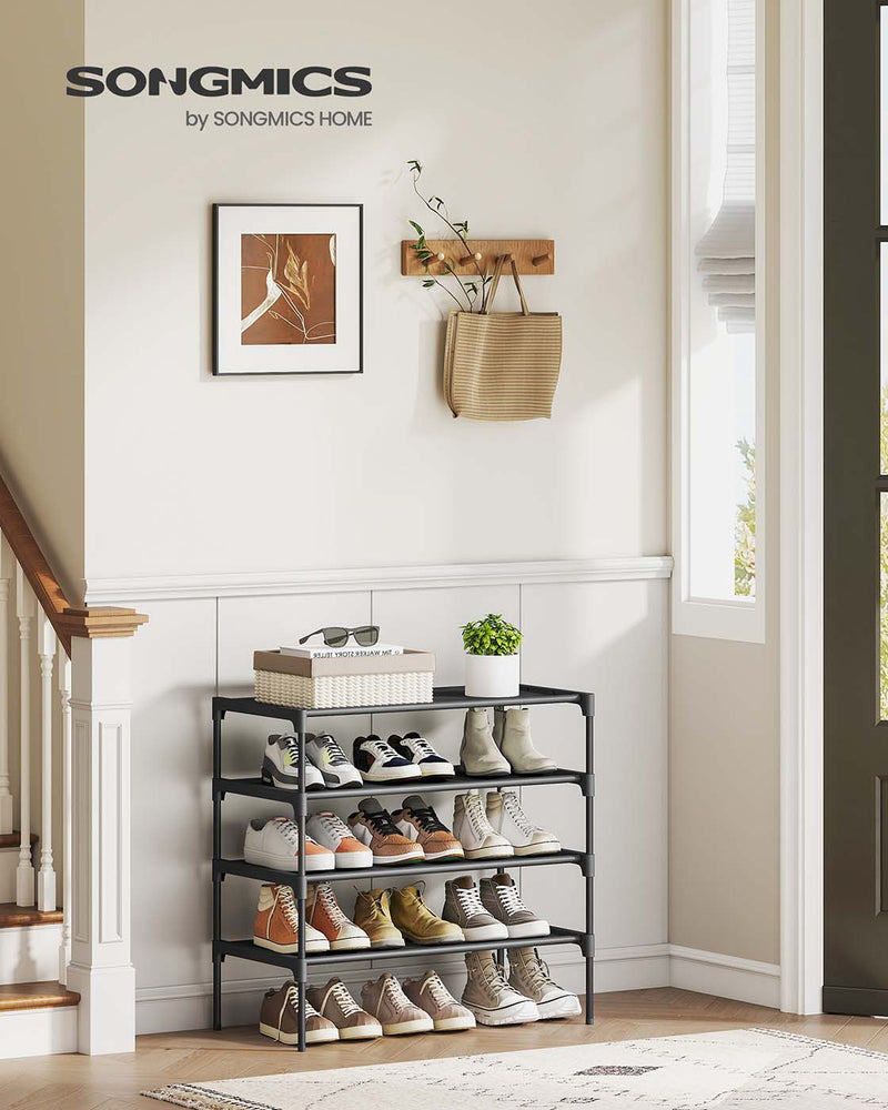 4-tier shoe rack in an entryway beside a framed print and a hanging basket