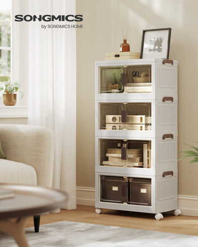 The white 4-tier Songmics storage tower styled beside an armchair in a bright living room
