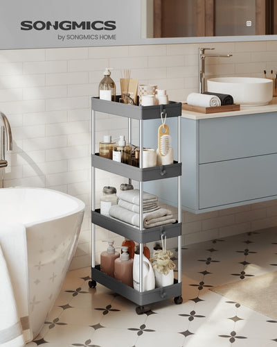 Songmics dove grey storage trolley styled in a bathroom next to a bathtub and washbasin