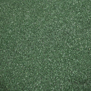 Close-up of the green asphalt granule covering on the shed roof