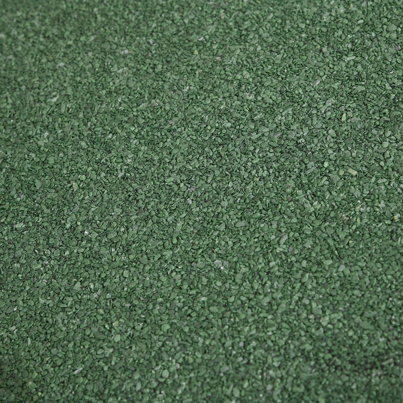 Close-up of the green asphalt granule covering on the shed roof