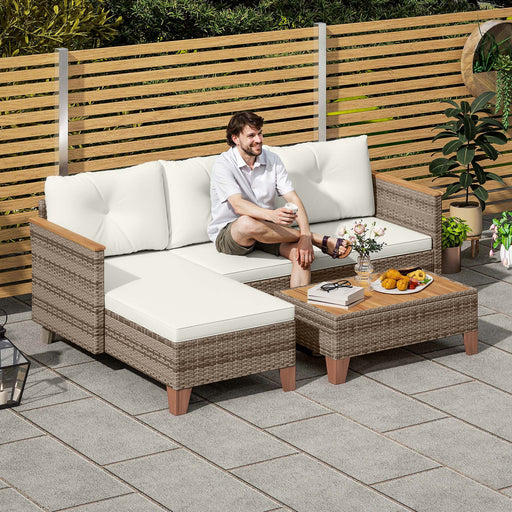 3 Piece Rattan Garden Sofa Set with Coffee Table and Cream Cushions