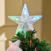 Close-up of the star tree topper and star lights on the branches