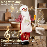 Chef Santa figure in a kitchen with music notes and a Cook with Me caption